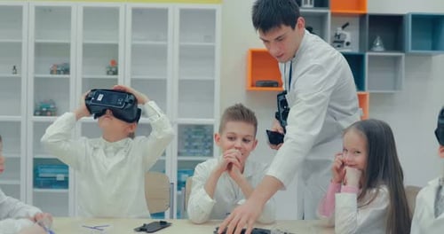 Children Using Virtual Reality Headsets in Science Class