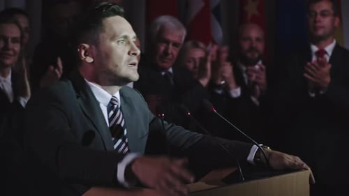 Man Giving a Speech at a Podium