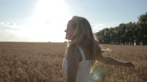 Charming Woman Enjoying Nature in Summertime