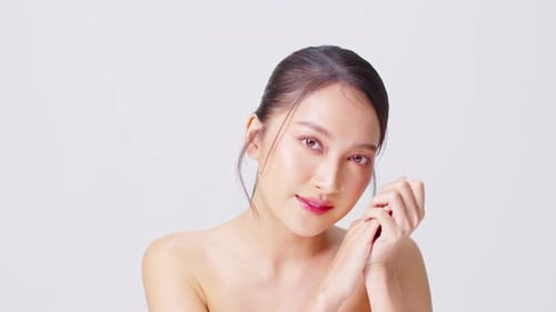 Beautiful Woman Posing with Hands on Face