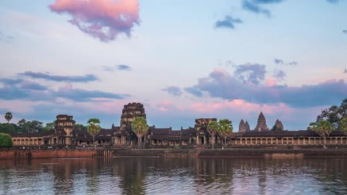 Sunset time lapse at Angkor Wat main facade silhouette. World famous temple in Cambodia