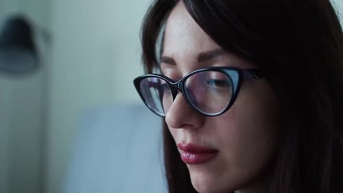 Close up of Woman Wearing Glasses Indoors