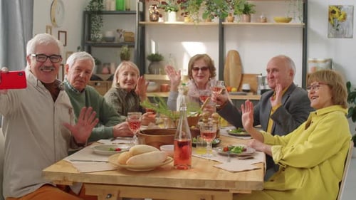 Group of Friends Taking Selfie at Dinner Party