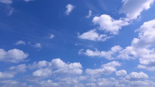Clouds Drifting in a Beautiful Blue Sky