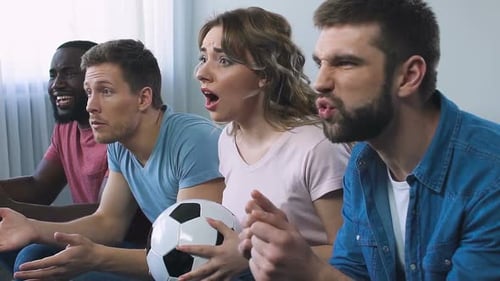Friends Watching Soccer Game with Excitement