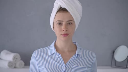 Young Woman with Towel on Head Smiling