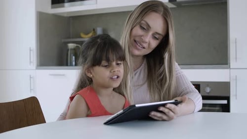 Mother and Child Watching Tablet Together