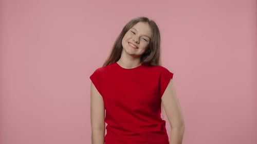 Smiling Young Adult in Red Shirt
