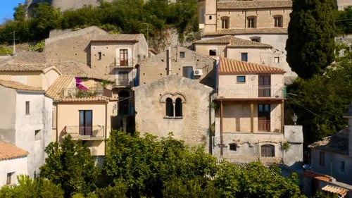 Medieval window, in Gerace