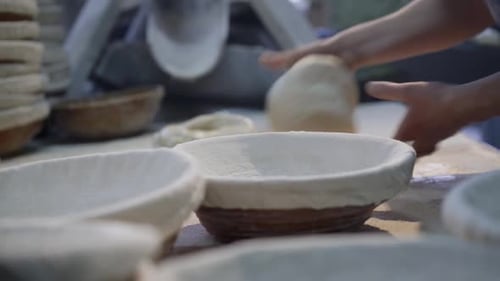 Baker Kneading and Shaping Dough for Baking