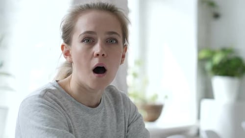 Surprised Young Woman in Close Up Shot