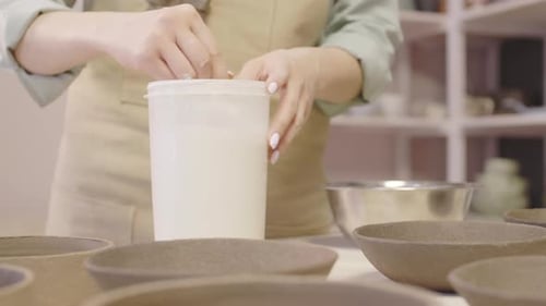 Close Up of Potter Preparing Clay