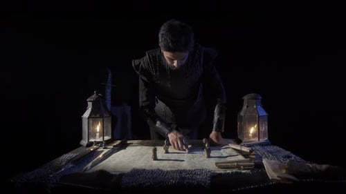 Man Planning Strategy in Dark Historical Setting