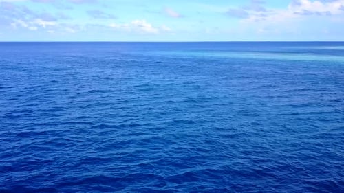 Aerial sky of bay beach by blue lagoon and sand background