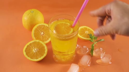 Iced Orange Juice with Fresh Fruit and Mint