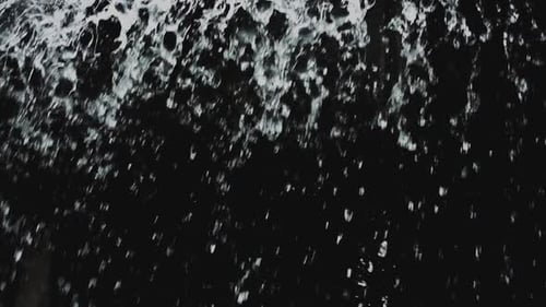 Crashing White Water on Black Background Close Up
