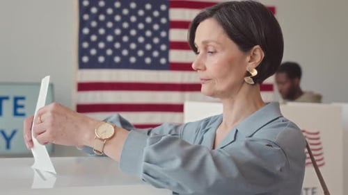 Adults Casting Ballots at Polling Place