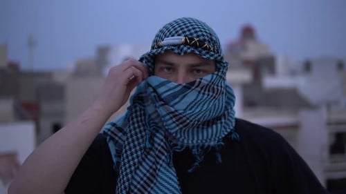 Young Adult Wearing Traditional Middle Eastern Headdress