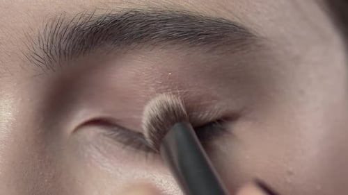 Macro Shot of Applying Makeup To the Woman's Eyelid, Evening Makeup, Smokey Eyes, Makeup in Progress