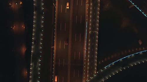 Aerial Top View of Highway Interchange at Night