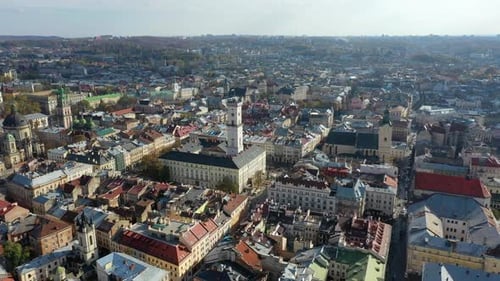 Aerial Drone Video of Lviv Old City Center - Roofs and Streets, City Hall Ratusha