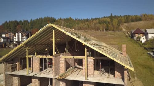 House Under Construction in Rural Setting