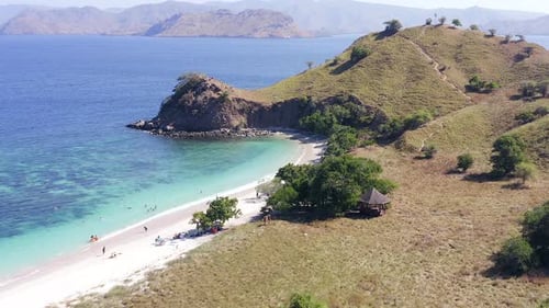 Aerial view of Pink Beach and Coral lined waters of Komodo National Park, Flores, Indonesia.