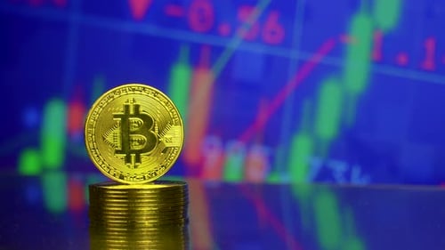 Gold Bitcoin with Stock Market Data Background