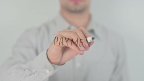 Drawing the Word Payment on a Clear Surface