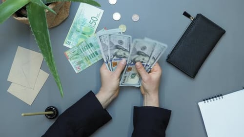 Counting money. American Dollars