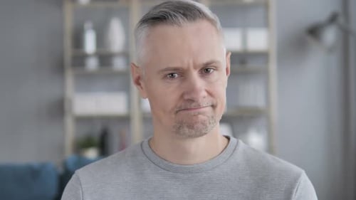 Close Up of Man Looking Directly at Camera