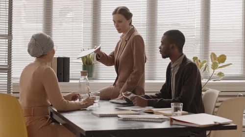 Muslim Woman Having Job Interview in Office
