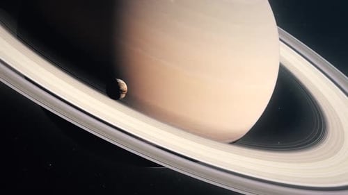 Saturn-like Planet with Rings and Moon Orbiting in Space