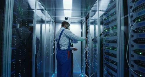 Two Men Working in a Data Center