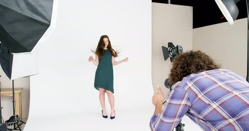 Woman Poses for Fashion Photoshoot in Studio