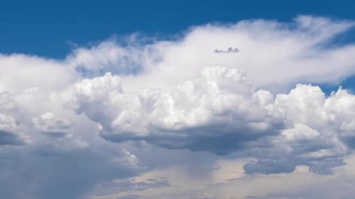 White Clouds Drifting in Blue Sky