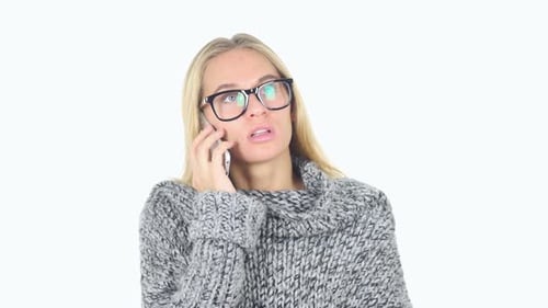 Woman With Glasses Talking on Mobile Phone