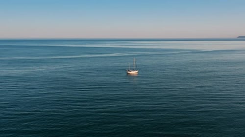 Sailing Ship Moored in the Blue Ocean