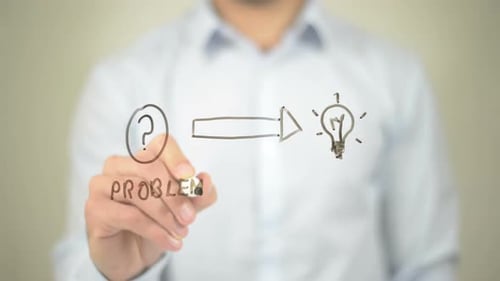 Problem Solution Concept, Businessman Writing on Transparent Screen