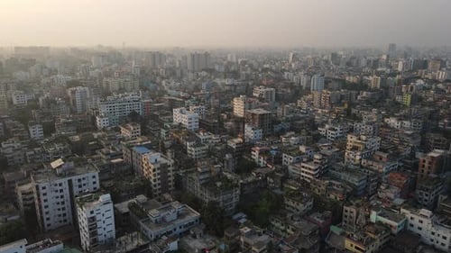 Aerial cityscape. Urbanization of a mega city with congested buildings. Top bird's eye view
