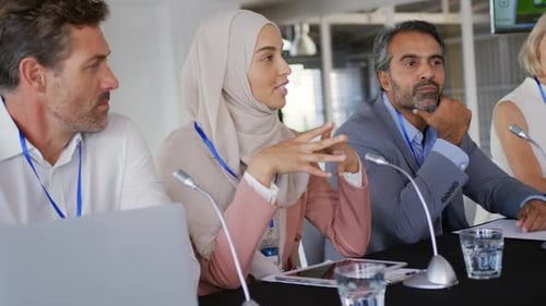 Diverse Panel Engaged in Corporate Board Meeting