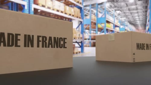 Boxes with MADE IN FRANCE Text on Conveyor