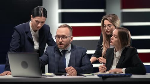 Team of Adults Collaborating in an Office