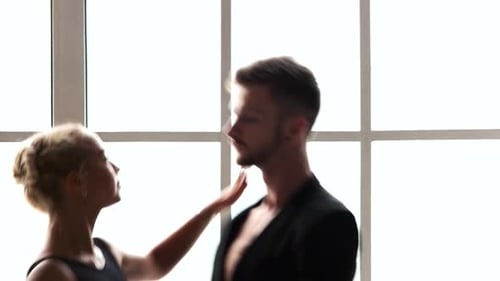 Couple of Sporty Ballet Dancers Dancing in Studio