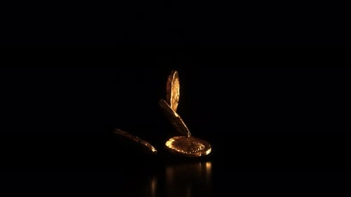 Golden and shiny Ancient Roman Coins falling on black background. Money stacked. 4k footage