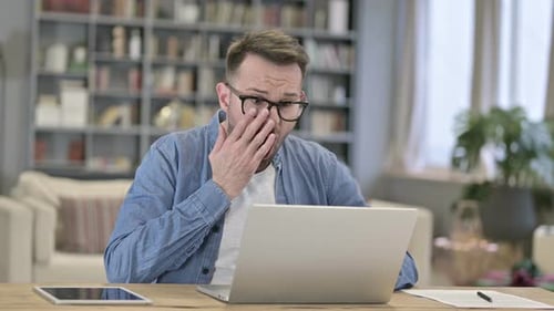Shocked Young Man Reacting To Failure
