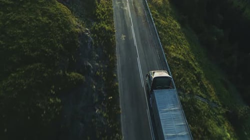 Aerial View of Over Twoline Road with Cargo Truck Lorry Moving to Logistics Center Driving Across