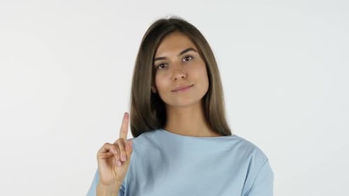 Waving Finger, No, Denying Beautiful Girl, White Background in Studio