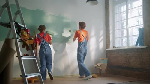 Young Couple Making House Renovation Indoors