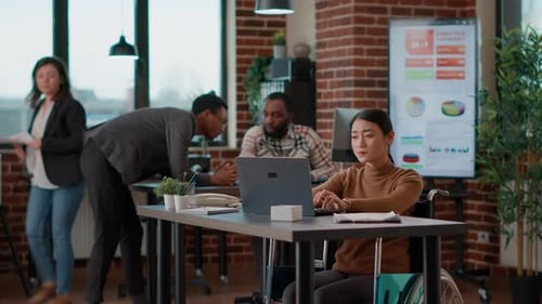 Office Colleagues Work Together in Modern Office